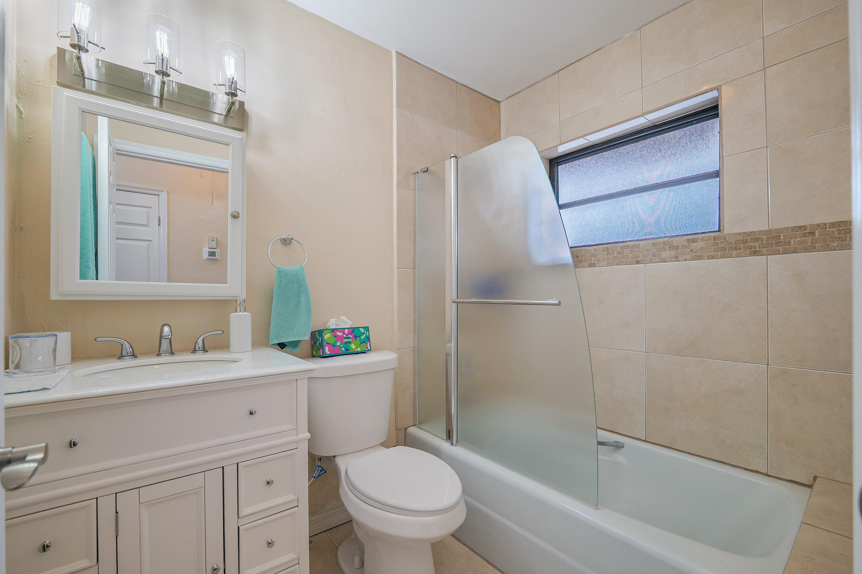 3425 Lime Hill Road, Unit 169 Lauderhill, FL 33319 - Photo 20 of 51 a bathroom with a sink toilet and shower