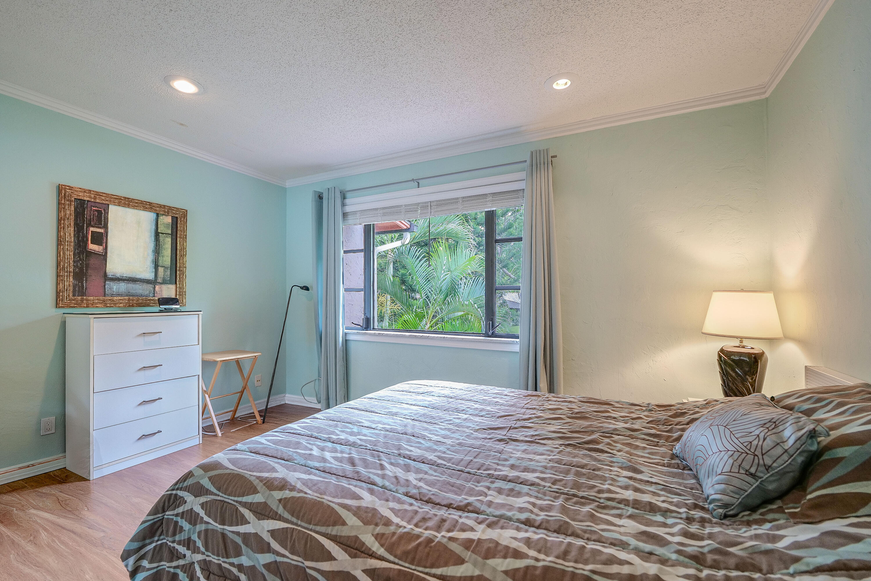 3425 Lime Hill Road, Unit 169 Lauderhill, FL 33319 - Photo 21 of 51 a bedroom with a bed and a dresser