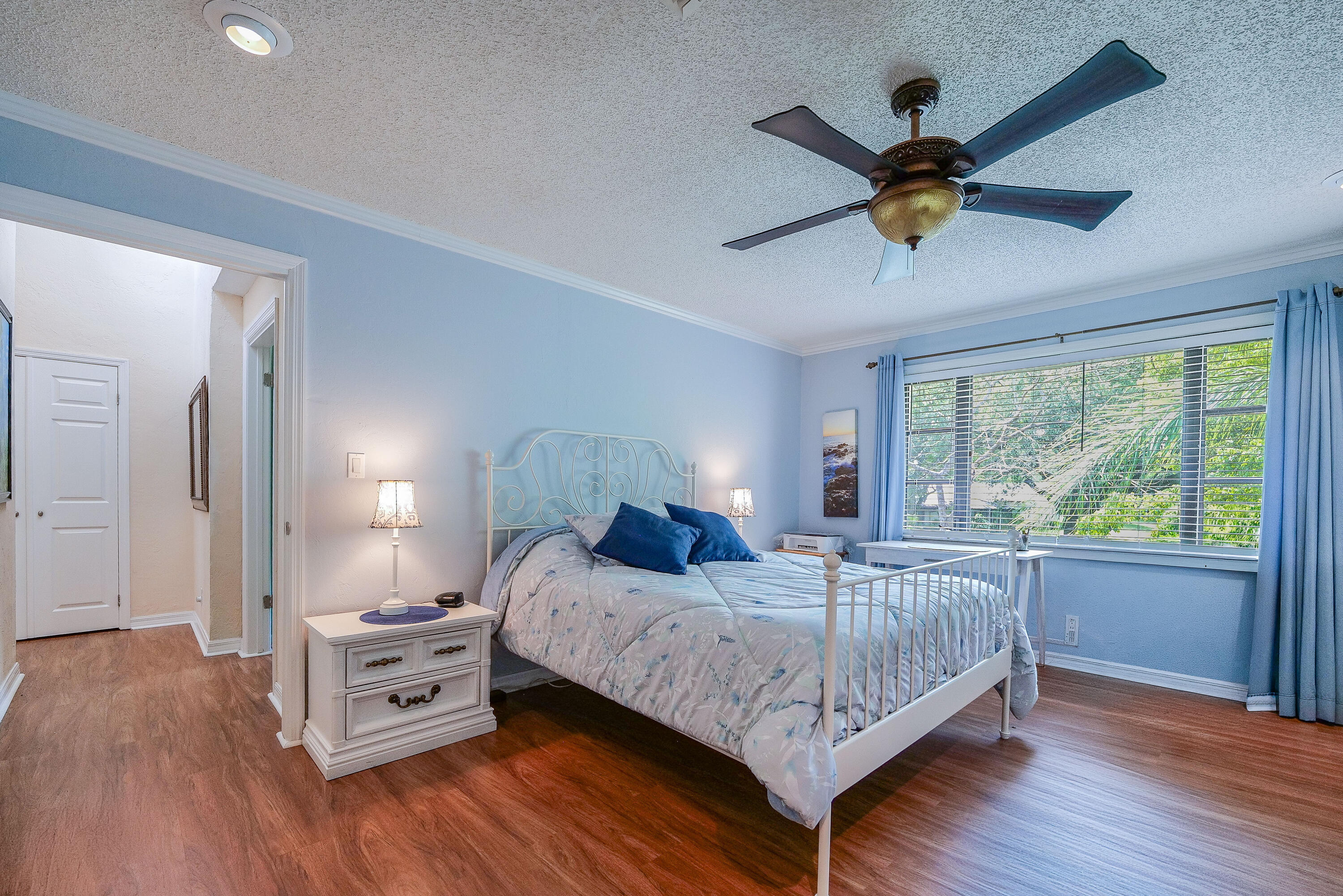 3425 Lime Hill Road, Unit 169 Lauderhill, FL 33319 - Photo 24 of 51 a bedroom with a bed and a window