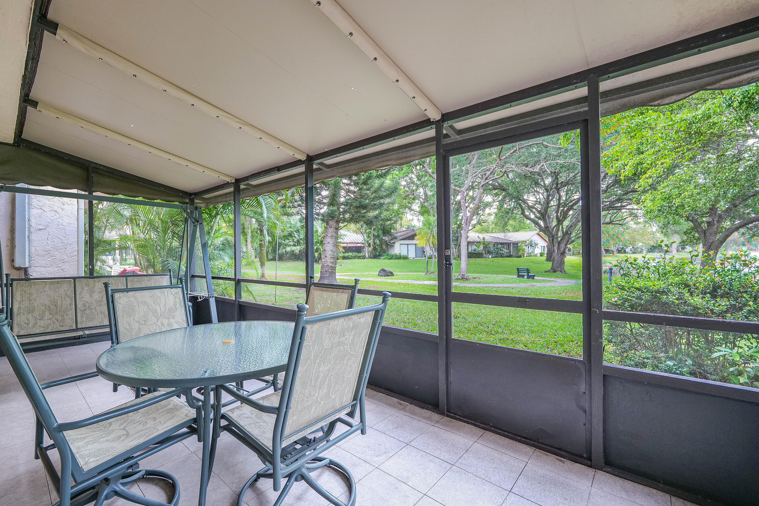 3425 Lime Hill Road, Unit 169 Lauderhill, FL 33319 - Photo 3 of 51 a view of a dining room with furniture window and outside view