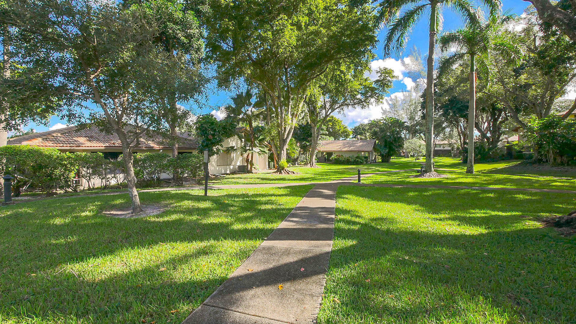 3425 Lime Hill Road, Unit 169 Lauderhill, FL 33319 - Photo 34 of 51 a view of a park with large trees