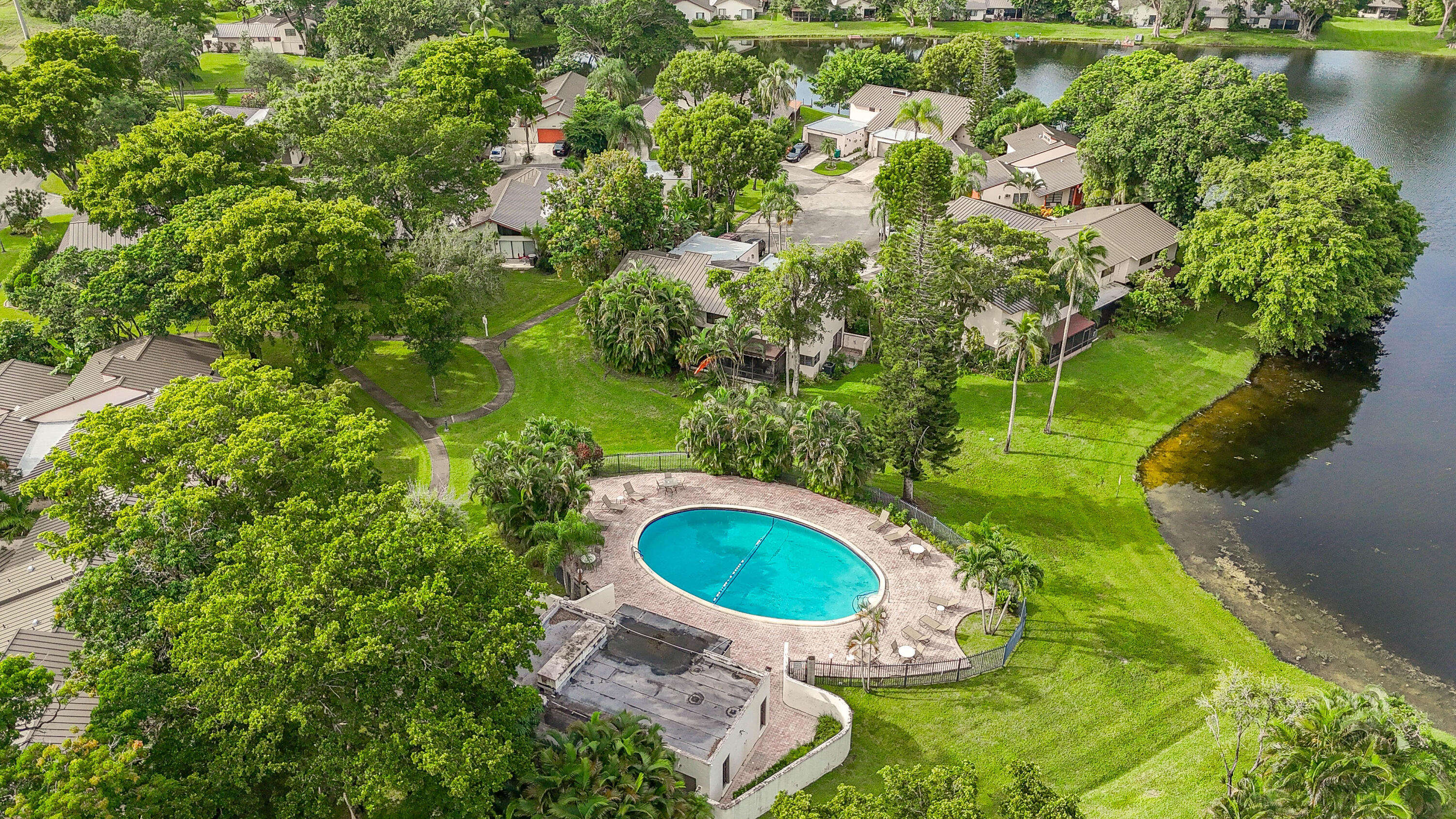 3425 Lime Hill Road, Unit 169 Lauderhill, FL 33319 - Photo 45 of 51 an aerial view of a house with a swimming pool yard and outdoor seating