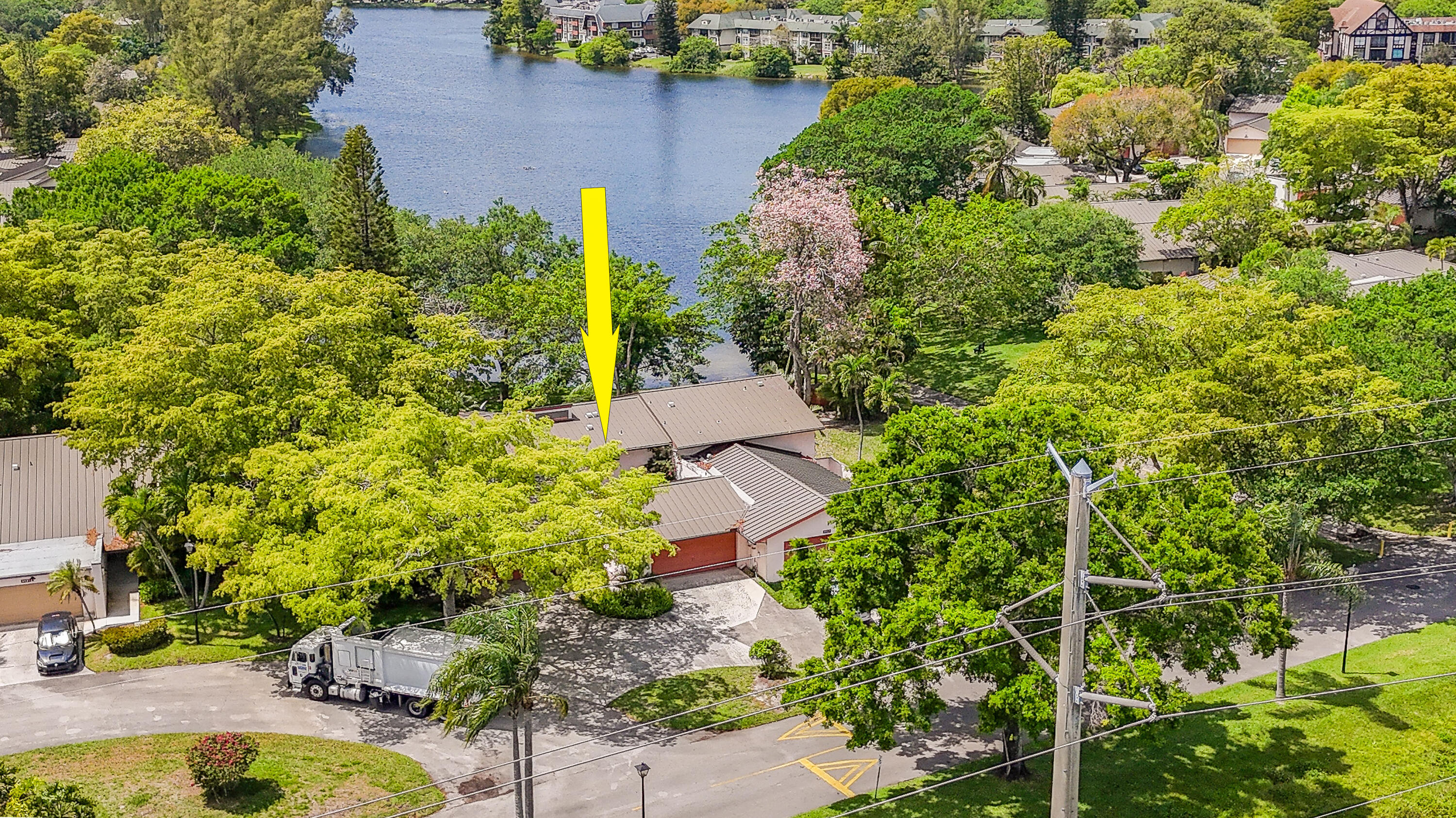 3425 Lime Hill Road, Unit 169 Lauderhill, FL 33319 - Photo 49 of 51 an aerial view of residential house with outdoor space and swimming pool