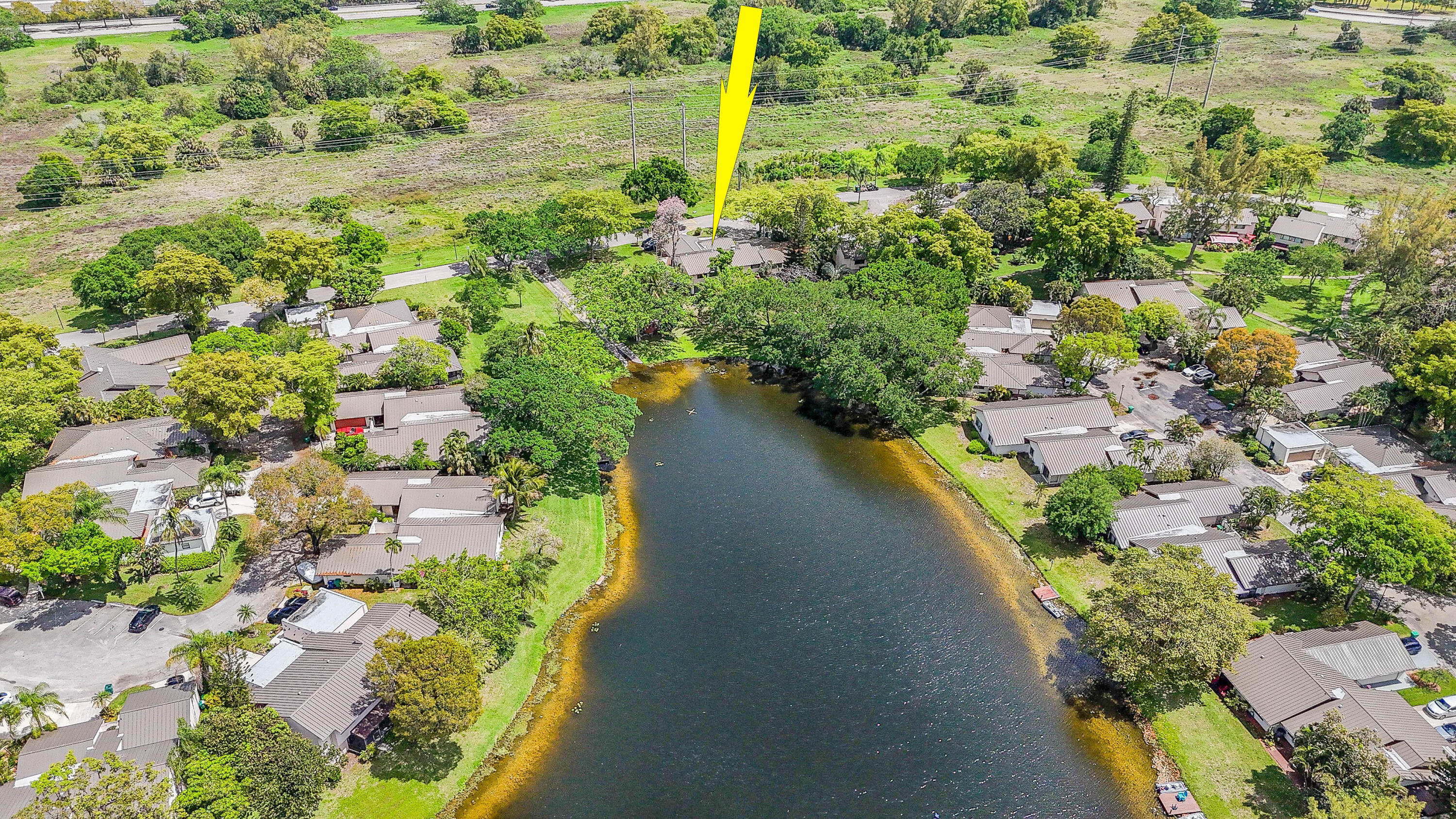 3425 Lime Hill Road, Unit 169 Lauderhill, FL 33319 - Photo 51 of 51 a view of a lake with a yard