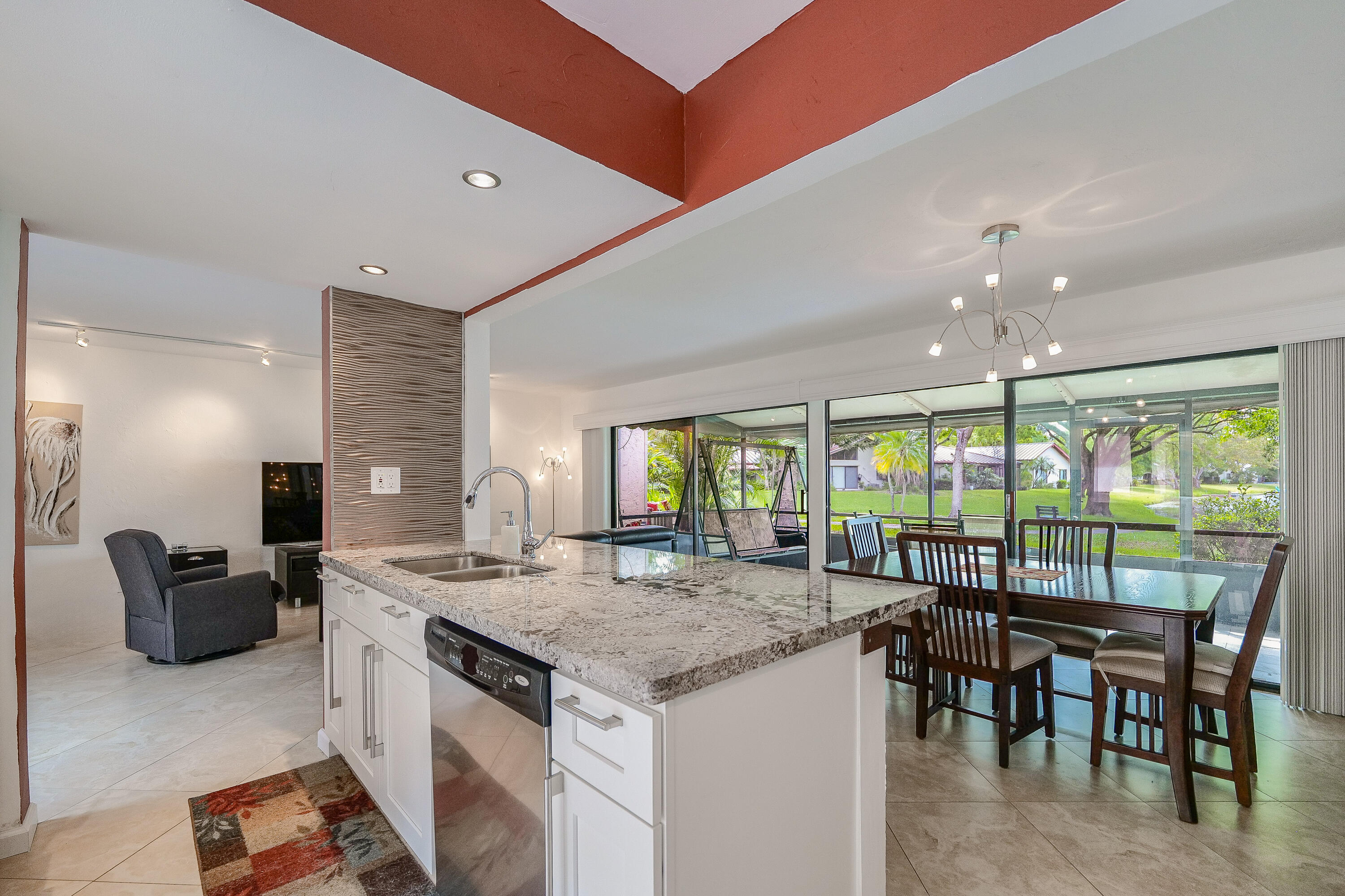 3425 Lime Hill Road, Unit 169 Lauderhill, FL 33319 - Photo 10 of 51 a kitchen with a stove and cabinets