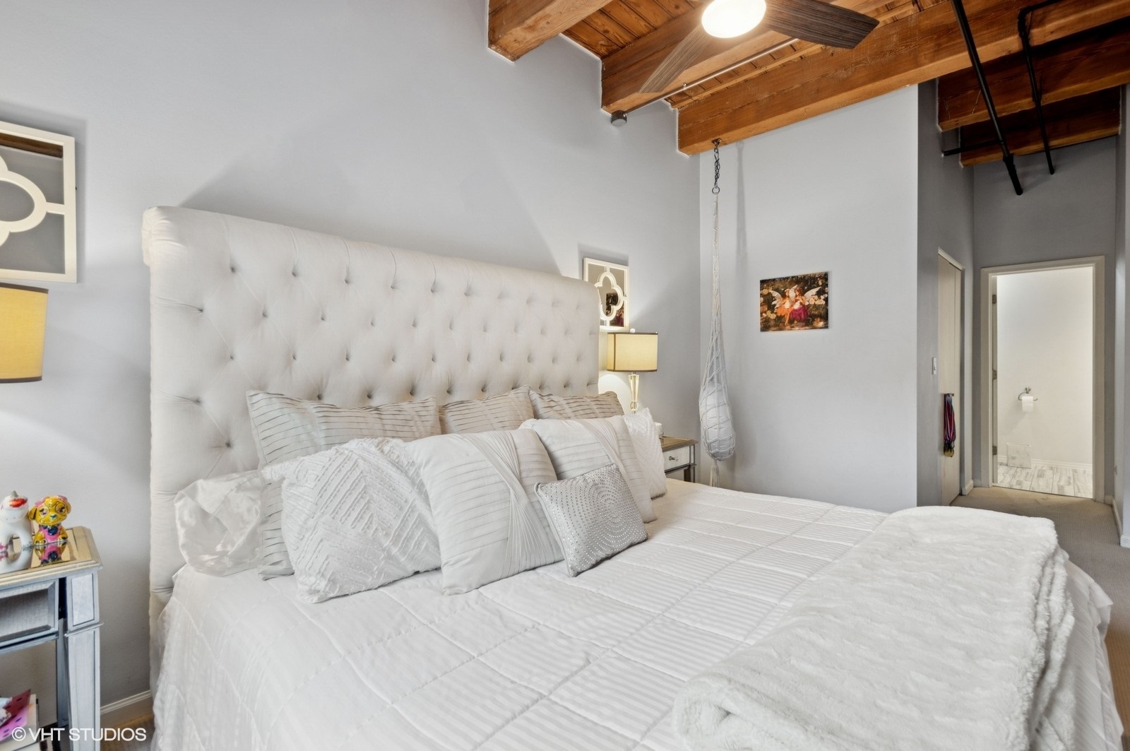 520 West Huron Street, Unit 109 Chicago, IL 60654 - Photo 7 of 14 a large white bed in a white room