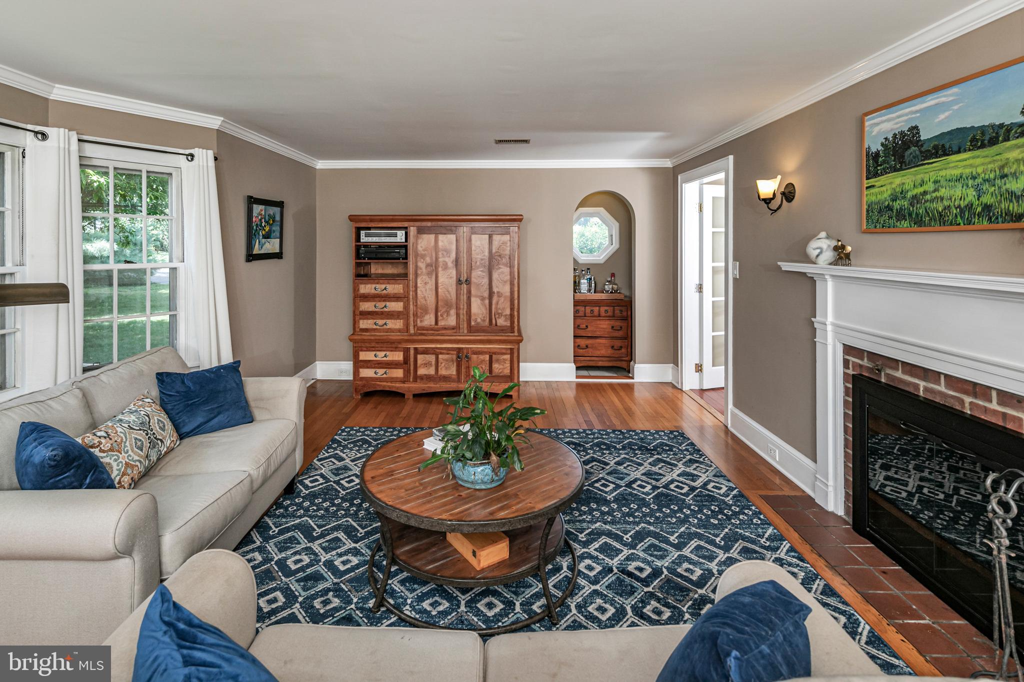 18 Mercer Street Hopewell, NJ 08525 - Photo 11 of 64 a living room with furniture and a fireplace