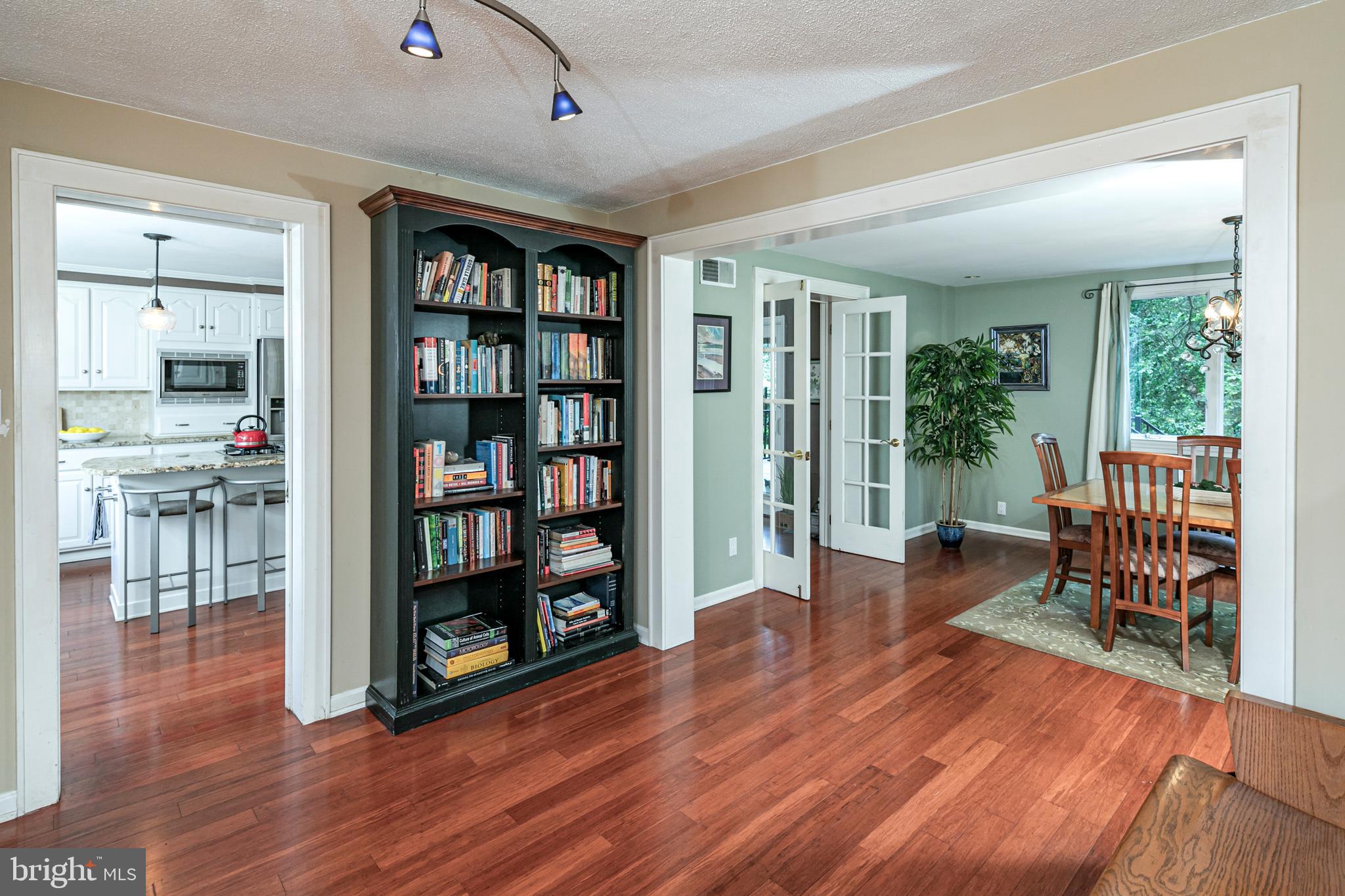 18 Mercer Street Hopewell, NJ 08525 - Photo 15 of 64 a living room with furniture and a book shelf