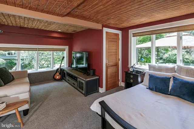 a room with furniture and a window