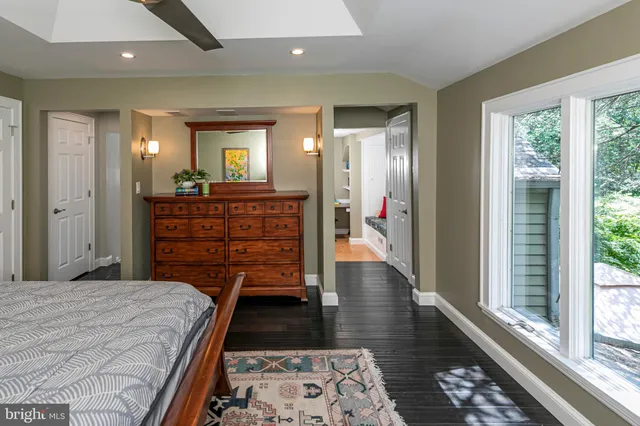 a view of a hallway with washer and dryer