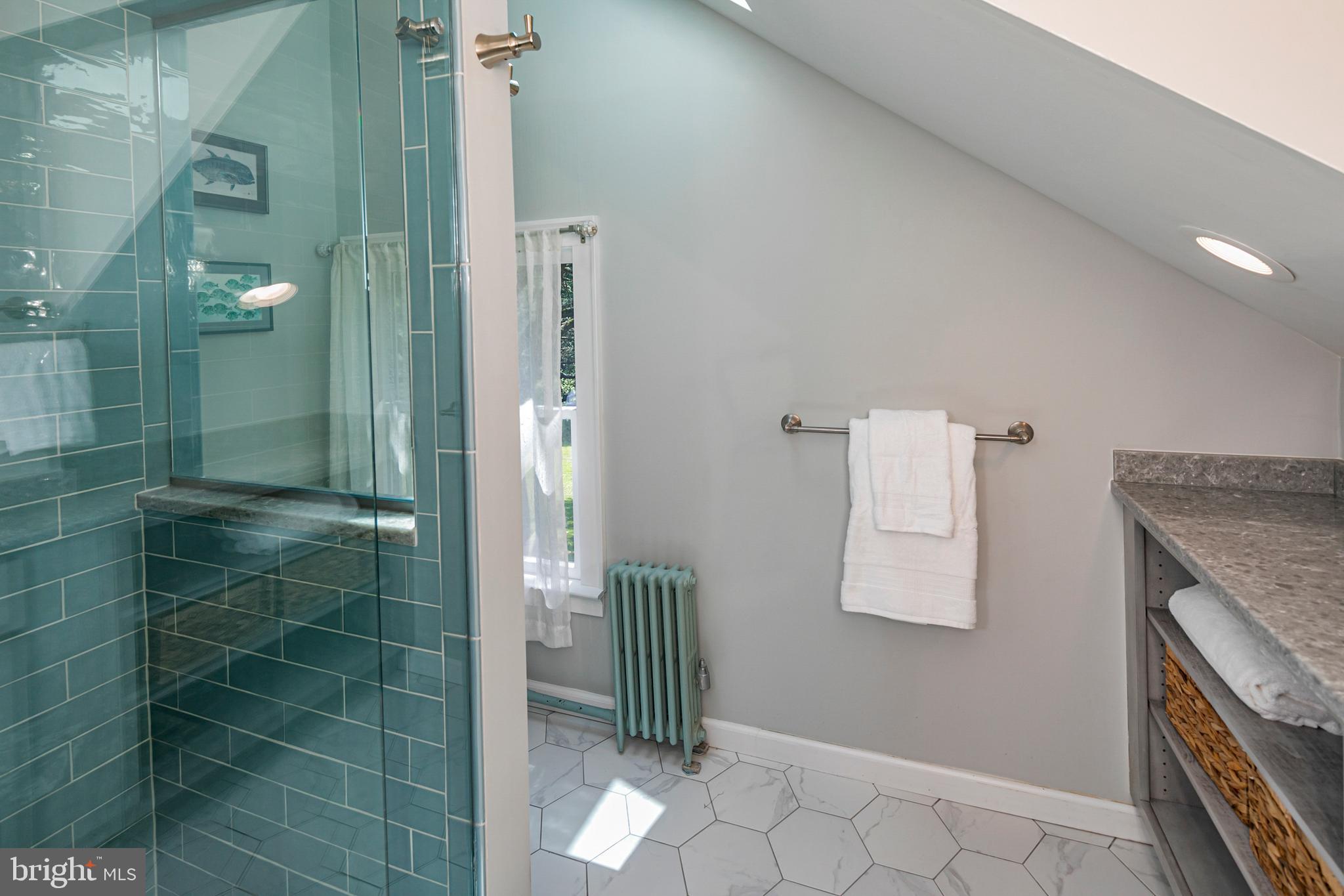 18 Mercer Street Hopewell, NJ 08525 - Photo 51 of 64 a bathroom with a granite countertop shower a mirror and a sink