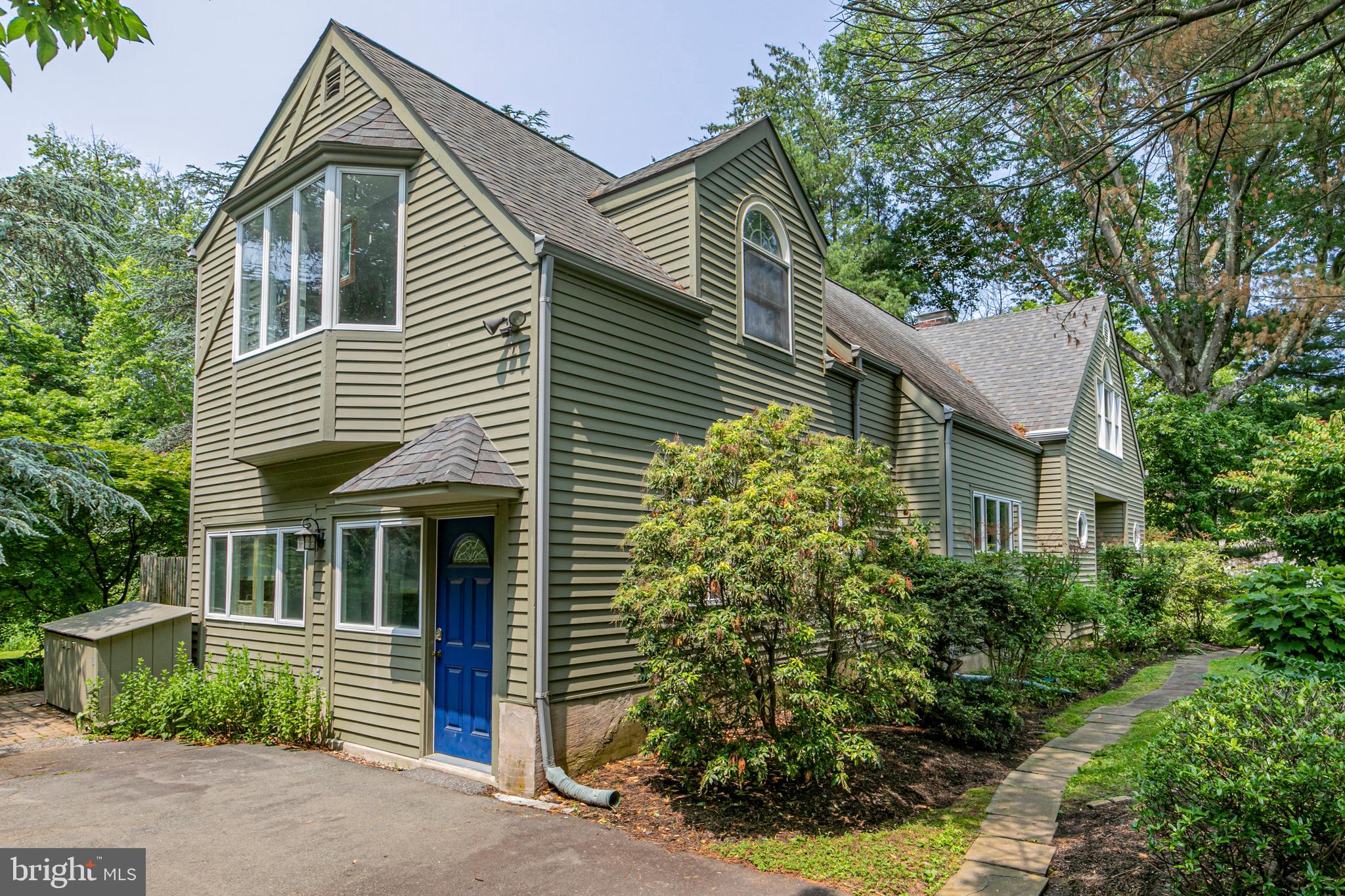 18 Mercer Street Hopewell, NJ 08525 - Photo 53 of 64 a front view of a house with a garden