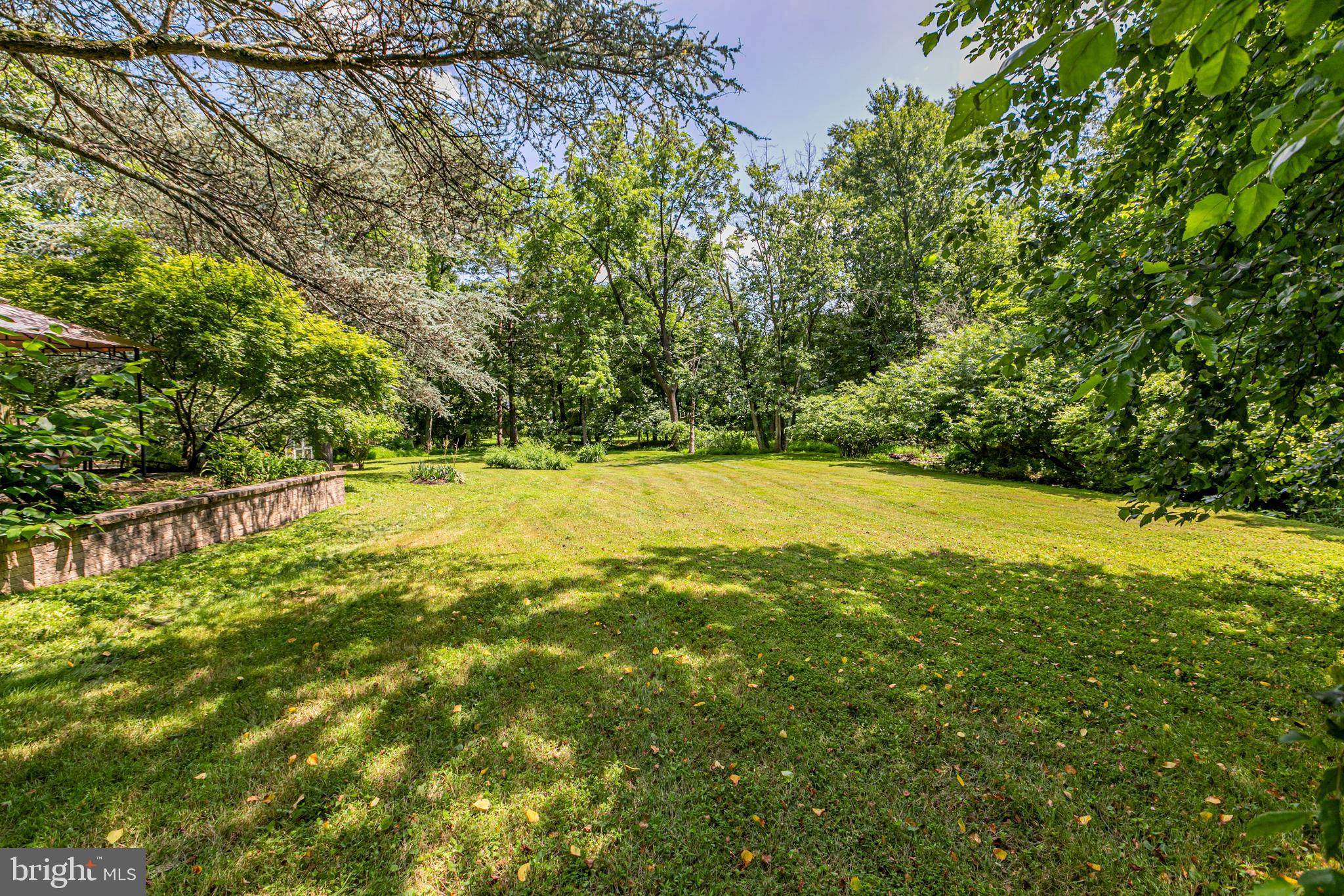 18 Mercer Street Hopewell, NJ 08525 - Photo 61 of 64 a view of yard with swimming pool and seating space