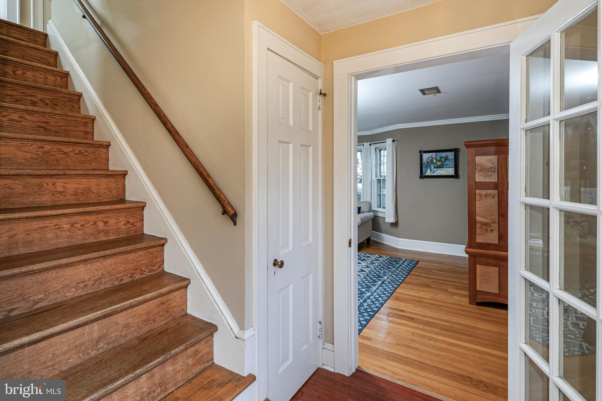 18 Mercer Street Hopewell, NJ 08525 - Photo 7 of 64 a view of a hallway with wooden floor and staircase