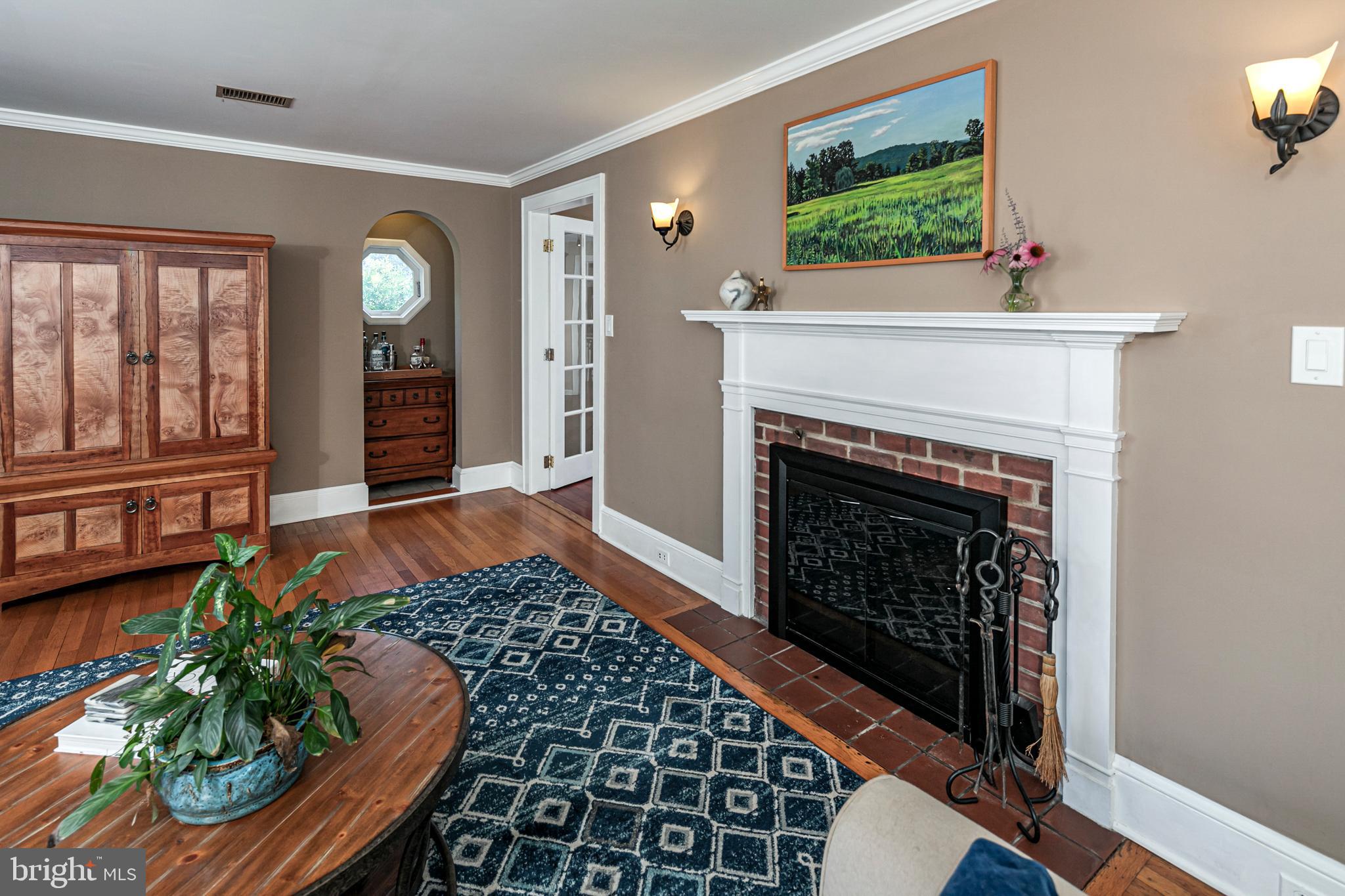 18 Mercer Street Hopewell, NJ 08525 - Photo 10 of 64 a living room with furniture and a fireplace