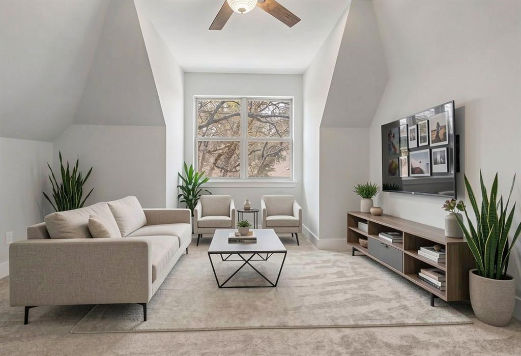 108 Winding Way Azle, TX 76020 - Photo 23 of 39 Living area with vaulted ceiling, ceiling fan, and light carpet