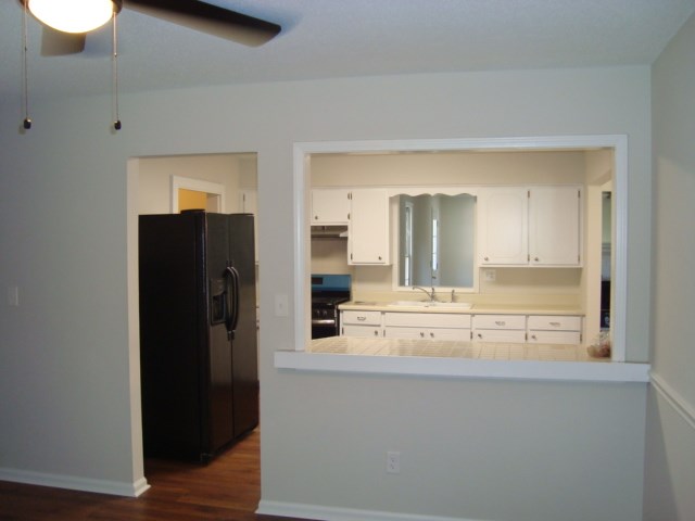 8224 Bryn Mawr Lane Columbus, GA 31904 - Photo 7 of 19 a view of kitchen with wooden floor