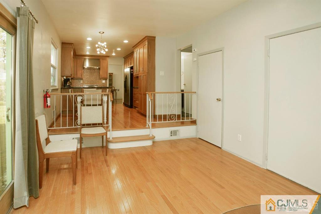 7 Douglas Drive Edison, NJ 08817 - Photo 11 of 26 a view of a bathroom with a tub and shower