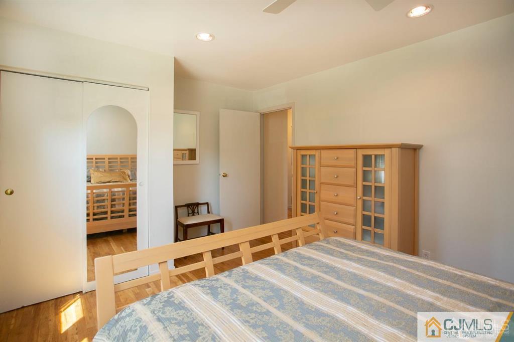 7 Douglas Drive Edison, NJ 08817 - Photo 16 of 26 a bedroom with a bed and a dresser