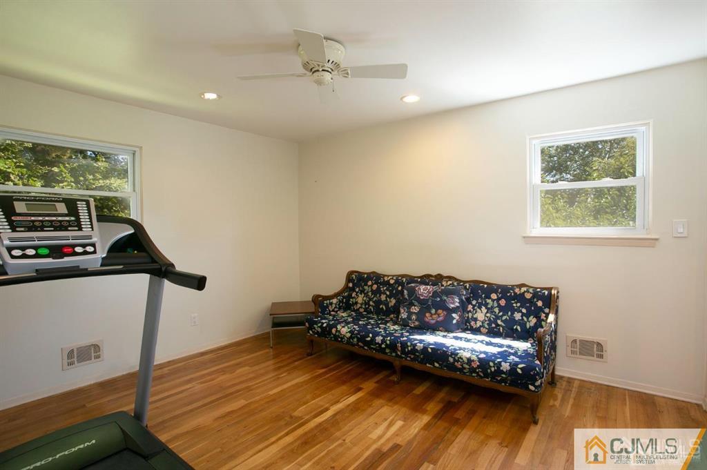 7 Douglas Drive Edison, NJ 08817 - Photo 17 of 26 a room with furniture and a window