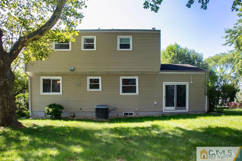 7 Douglas Drive Edison, NJ 08817 - Photo 23 of 26 a view of a house with backyard and garden