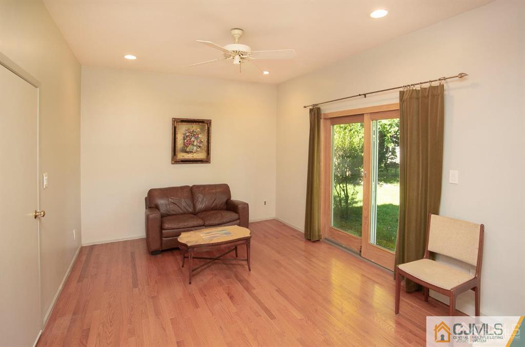 7 Douglas Drive Edison, NJ 08817 - Photo 10 of 26 a living room with furniture and a window