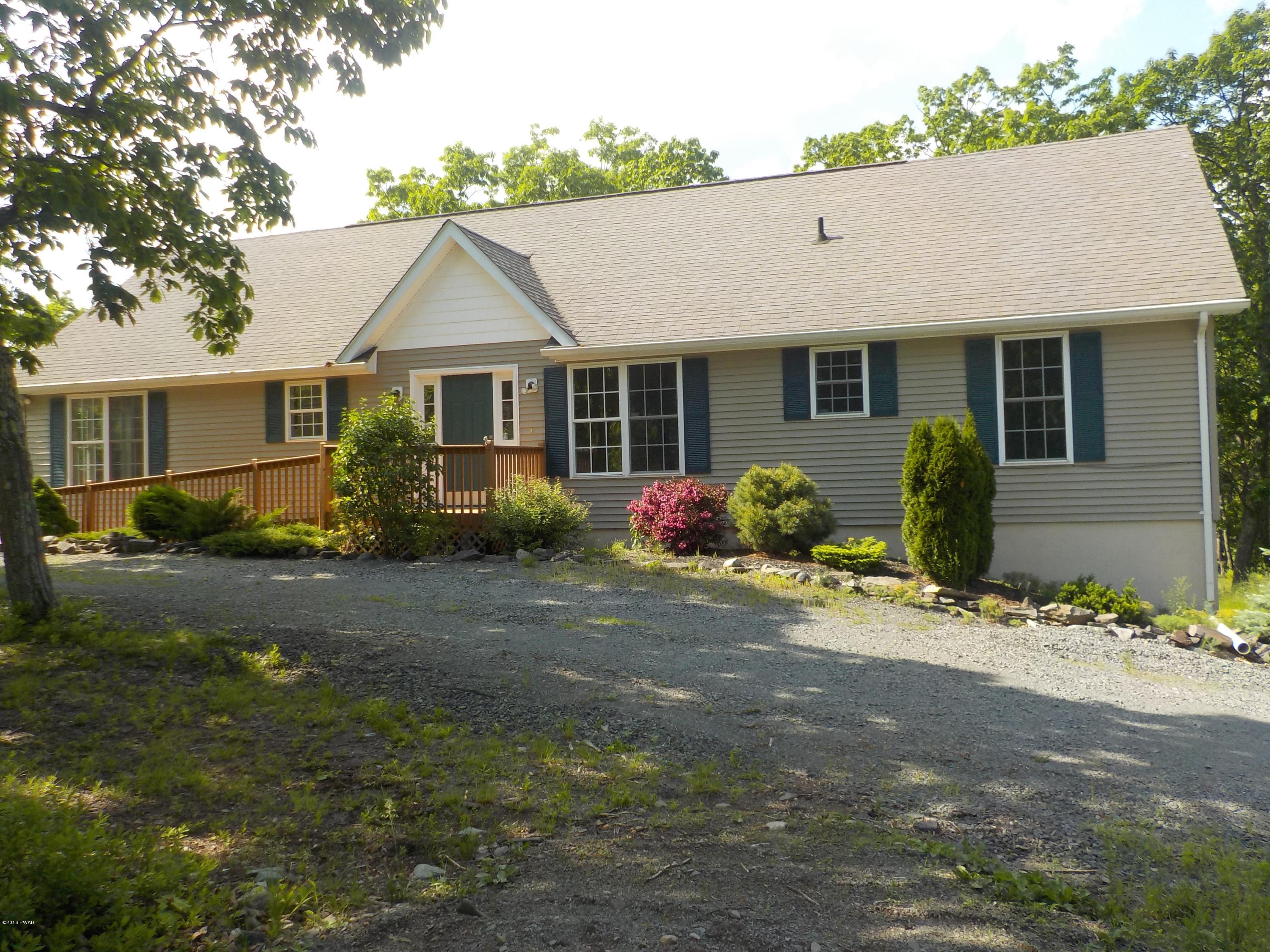 230 Maple Ridge Drive Hawley, PA 18428 - Photo 2 of 35 a view of a house with a yard