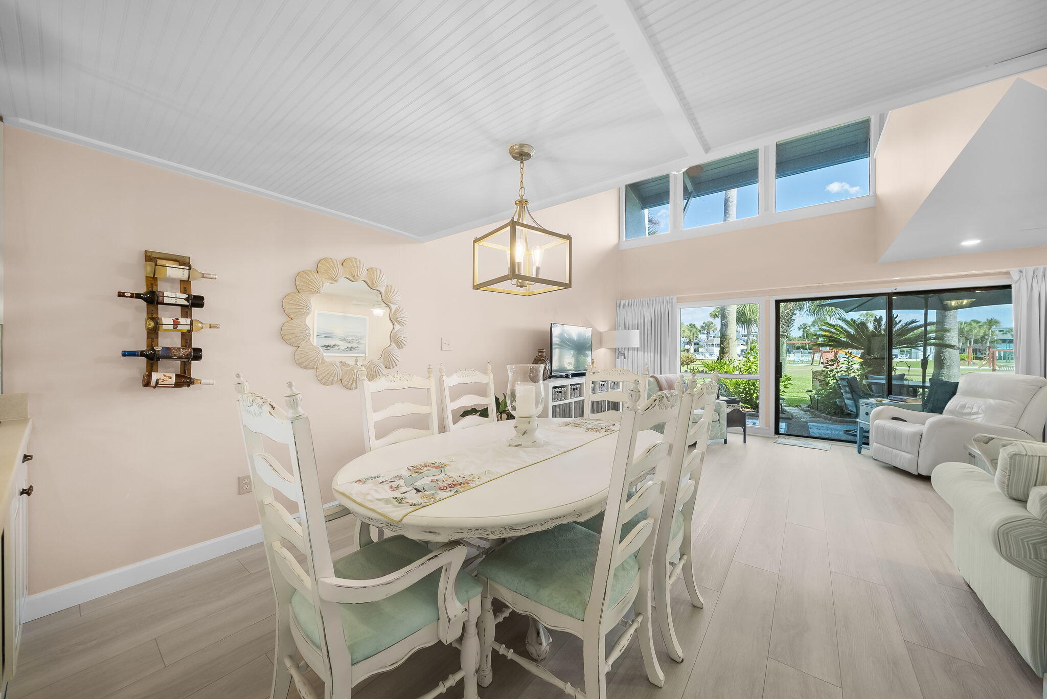 22400 Front Beach Road, Unit 24 Panama City Beach, FL 32413 - Photo 11 of 41 a view of a dining room with furniture window and outside view