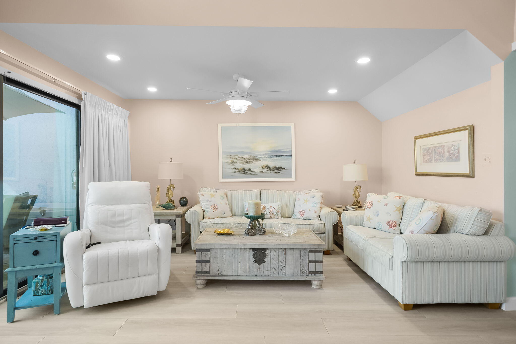 22400 Front Beach Road, Unit 24 Panama City Beach, FL 32413 - Photo 12 of 41 a living room with furniture and a painting