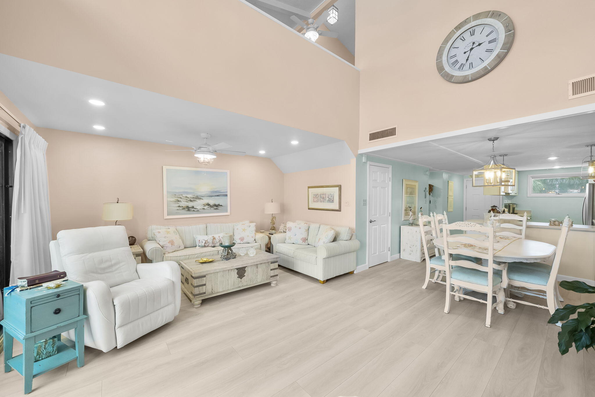 22400 Front Beach Road, Unit 24 Panama City Beach, FL 32413 - Photo 13 of 41 a living room with furniture and a wooden floor