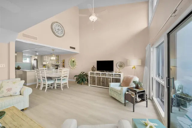 a spacious bathroom with a sink a large mirror and a shower