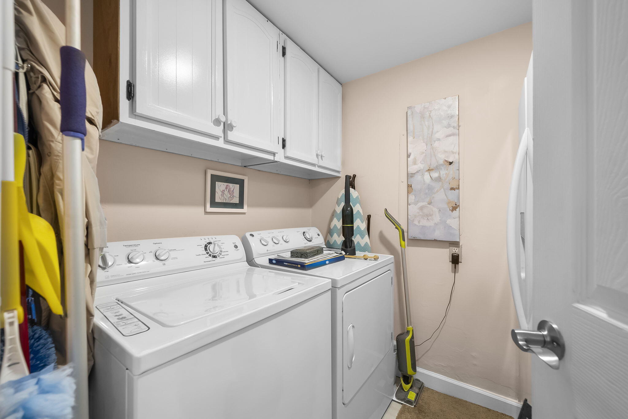 22400 Front Beach Road, Unit 24 Panama City Beach, FL 32413 - Photo 16 of 41 a utility room with dryer and washer