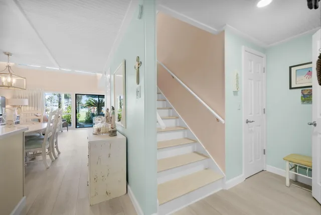 a room with furniture and flat screen tv