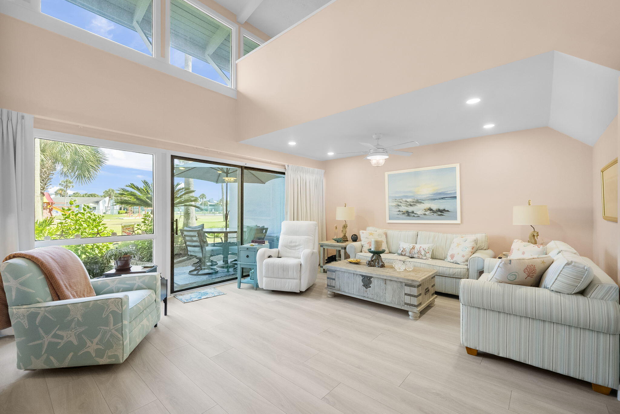 22400 Front Beach Road, Unit 24 Panama City Beach, FL 32413 - Photo 4 of 41 a living room with furniture and a large window