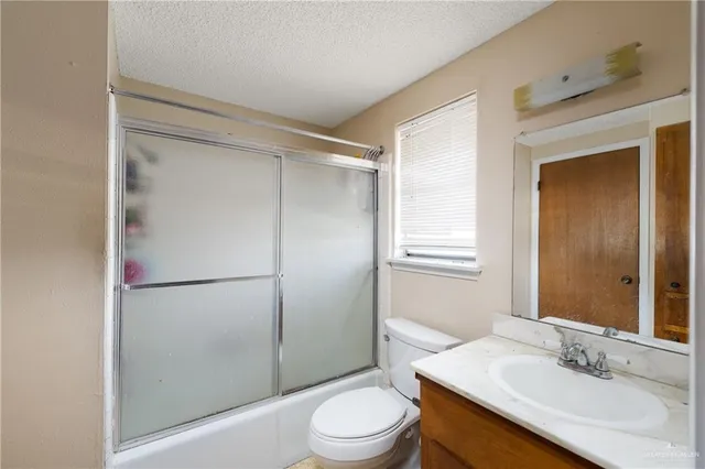 a bedroom with a bed and a closet