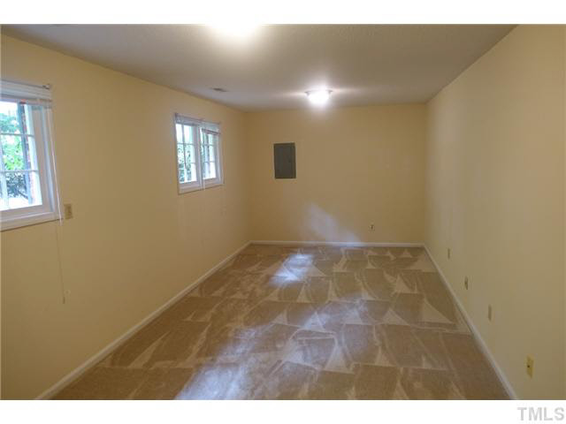 7124 Mill Ridge Road Raleigh, NC 27613 - Photo 17 of 23 Huge room could be used as 4th bedroom, man cave, playroom, office anything you want.