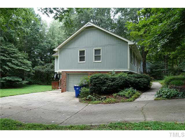 7124 Mill Ridge Road Raleigh, NC 27613 - Photo 2 of 23 Spacious concrete driveway and a 1 car garage.