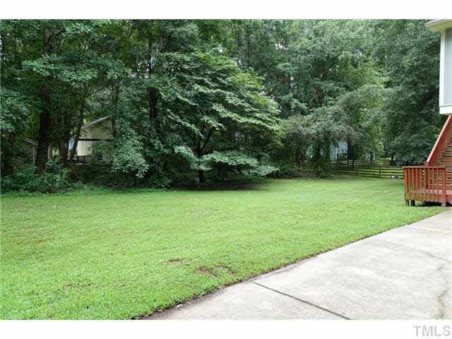 7124 Mill Ridge Road Raleigh, NC 27613 - Photo 22 of 23 Perfect as is or put in a fence and some flowering plants and make it your own