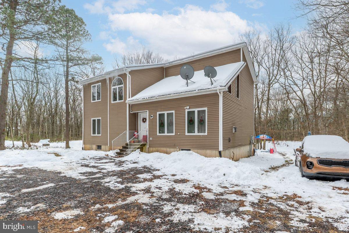 219 Mountain View Jim Thorpe, PA 18229 - Photo 2 of 38 a view of a house with a snow in the yard