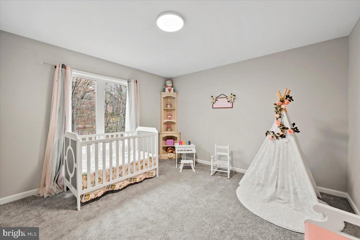 219 Mountain View Jim Thorpe, PA 18229 - Photo 24 of 38 a view of a bedroom with baby crib and a window
