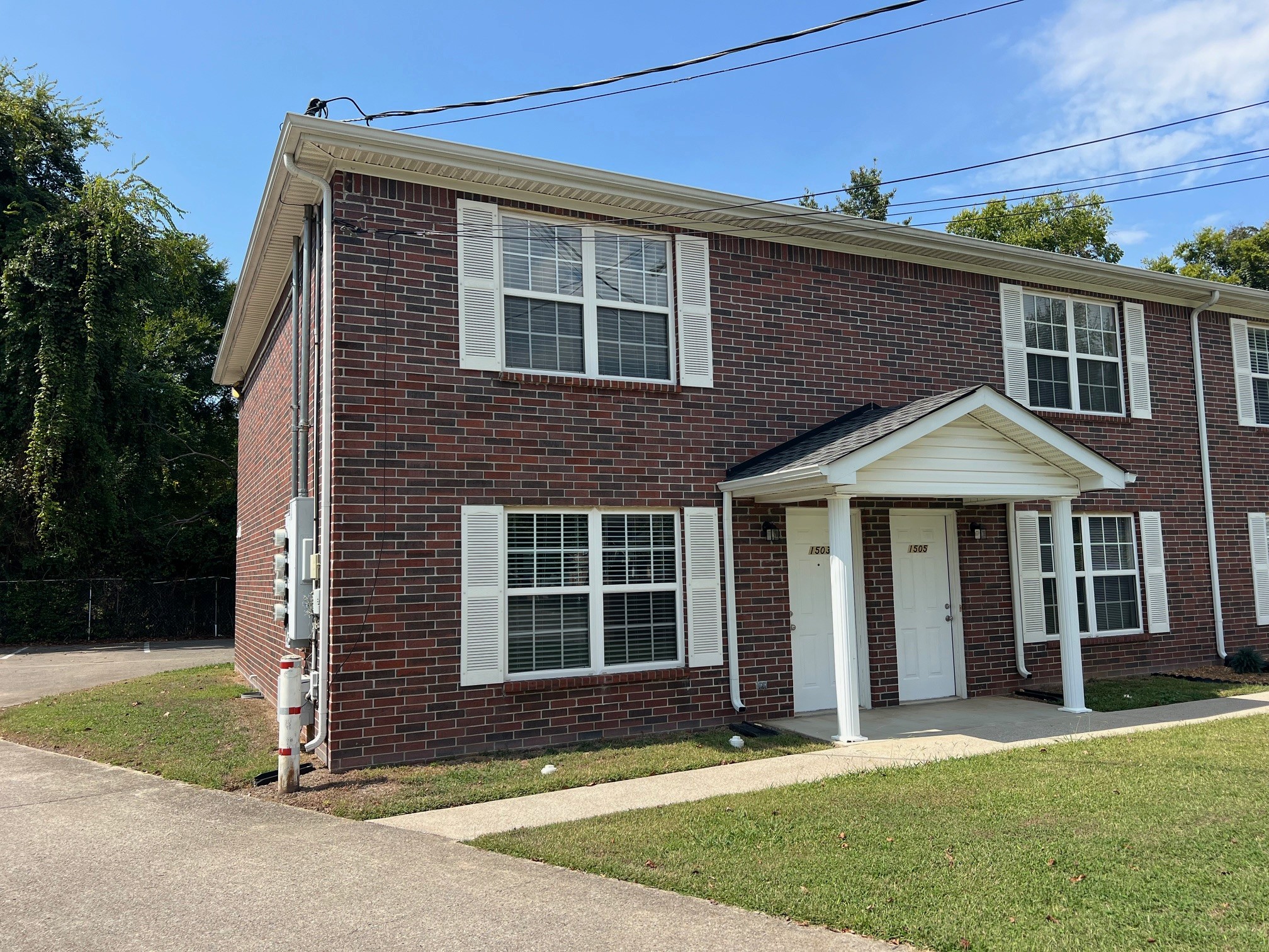 1503 Center Pointe Drive Murfreesboro, TN 37130 - Photo 1 of 17 a front view of a house with a yard