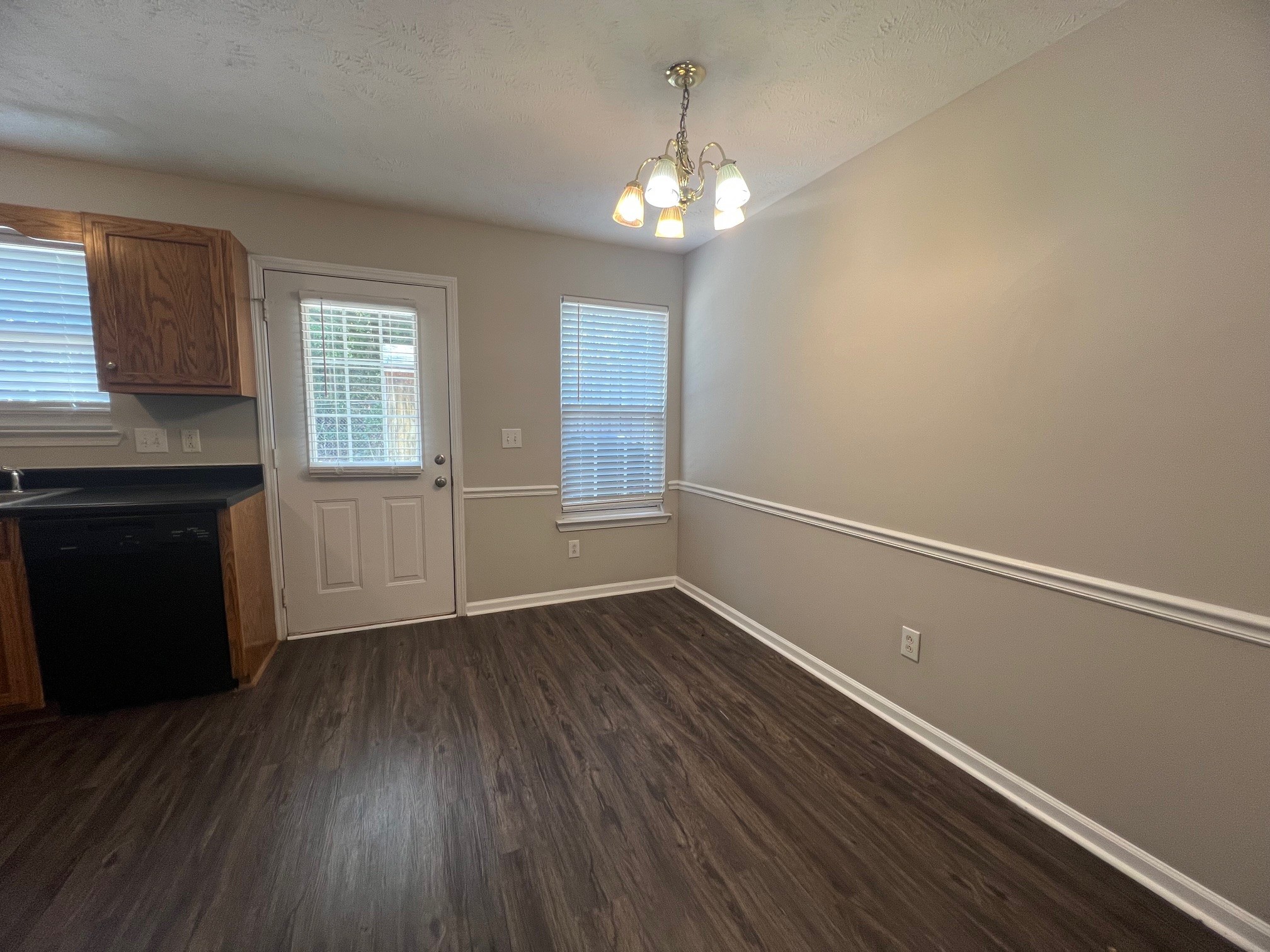 1503 Center Pointe Drive Murfreesboro, TN 37130 - Photo 6 of 17 an empty room with wooden floor and windows