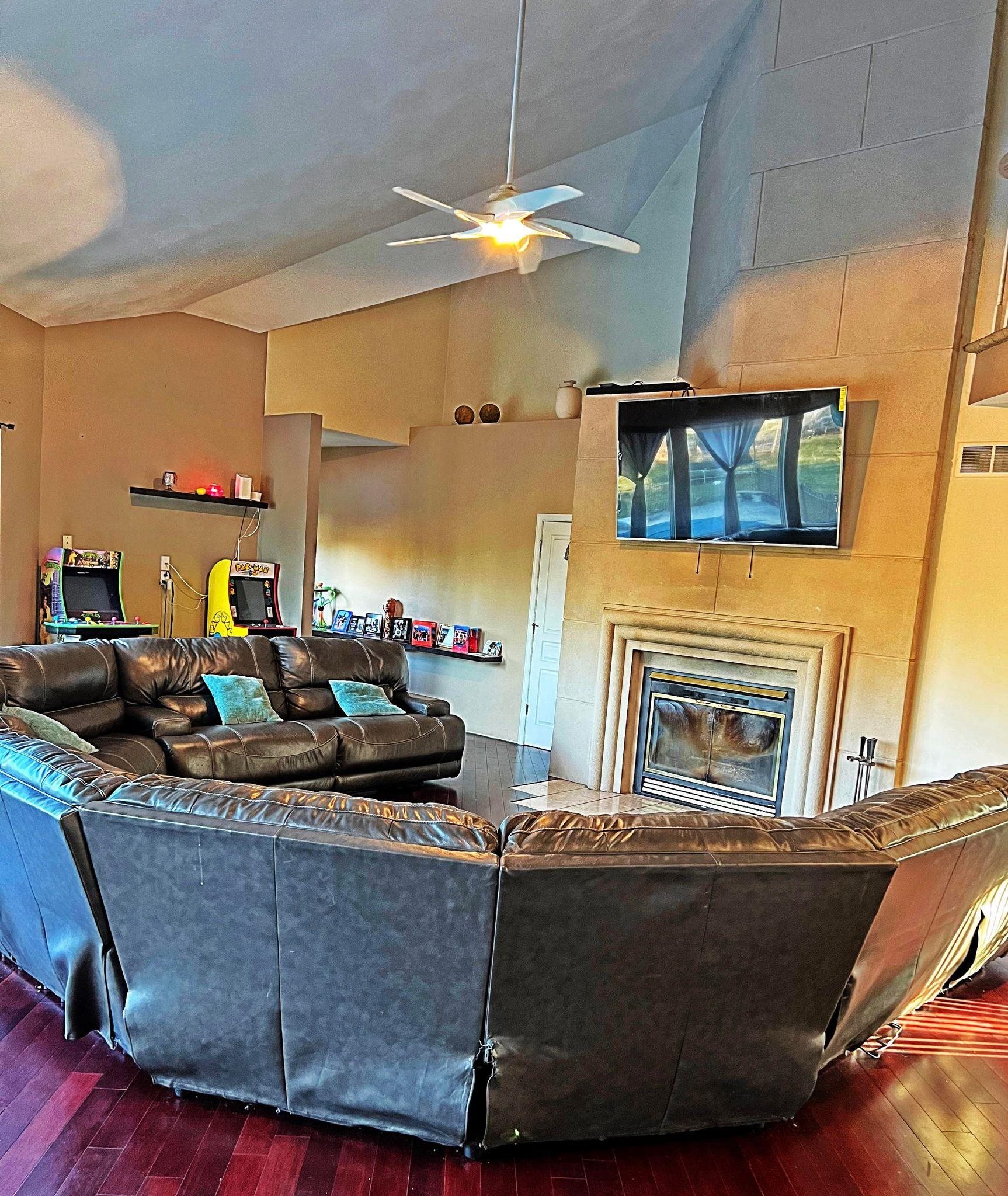 916 Olson Spring Close Belvidere, IL 61008 - Photo 11 of 32 a living room with furniture and a fireplace