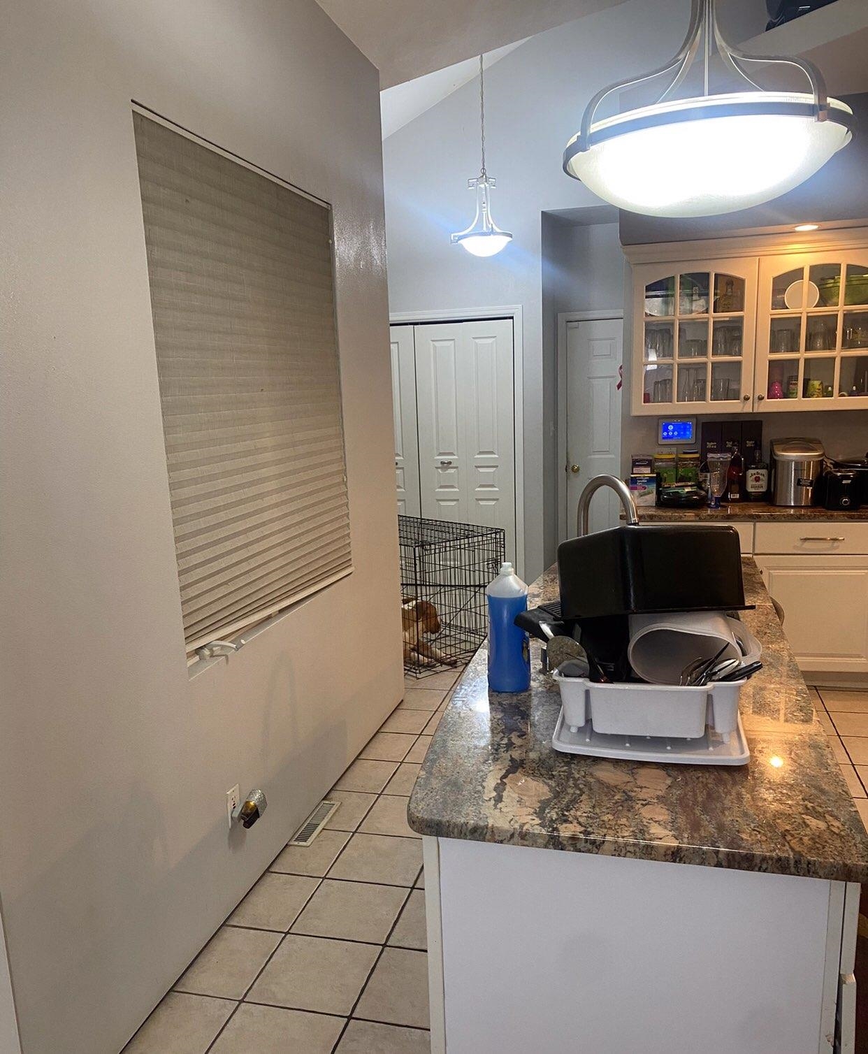 916 Olson Spring Close Belvidere, IL 61008 - Photo 13 of 32 a kitchen with a granite countertop sink and cabinets