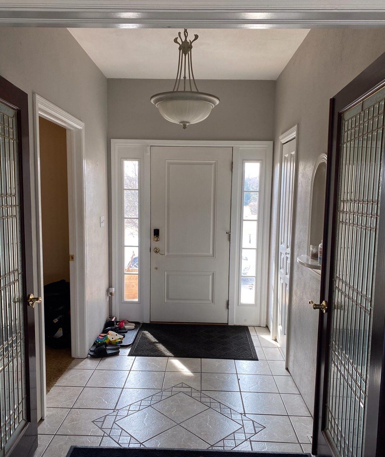 916 Olson Spring Close Belvidere, IL 61008 - Photo 20 of 32 a view of a entrance door of the house