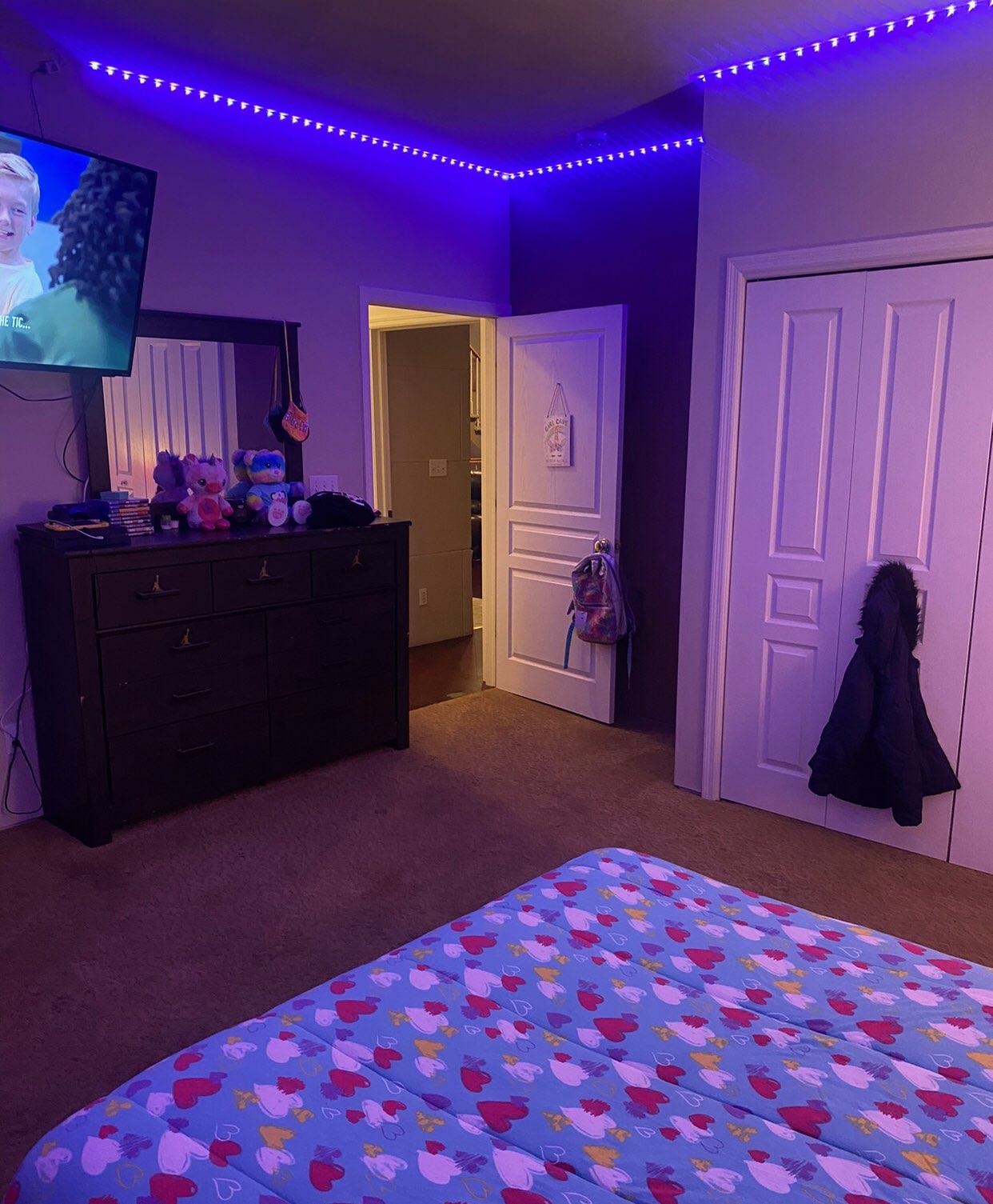 916 Olson Spring Close Belvidere, IL 61008 - Photo 23 of 32 a bedroom with a bed and a dresser