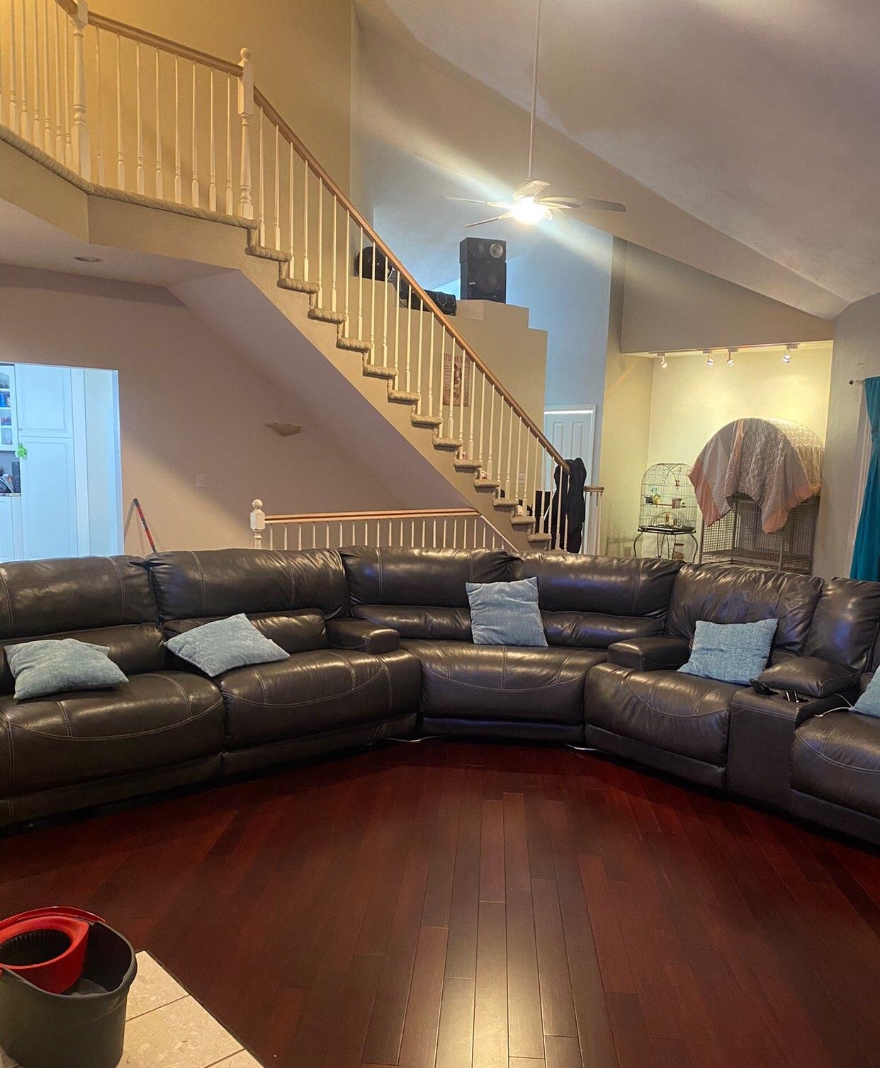 916 Olson Spring Close Belvidere, IL 61008 - Photo 24 of 32 a living room with furniture and stairs