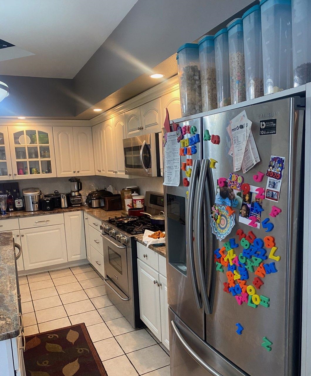 916 Olson Spring Close Belvidere, IL 61008 - Photo 27 of 32 a kitchen with stainless steel appliances and cabinets