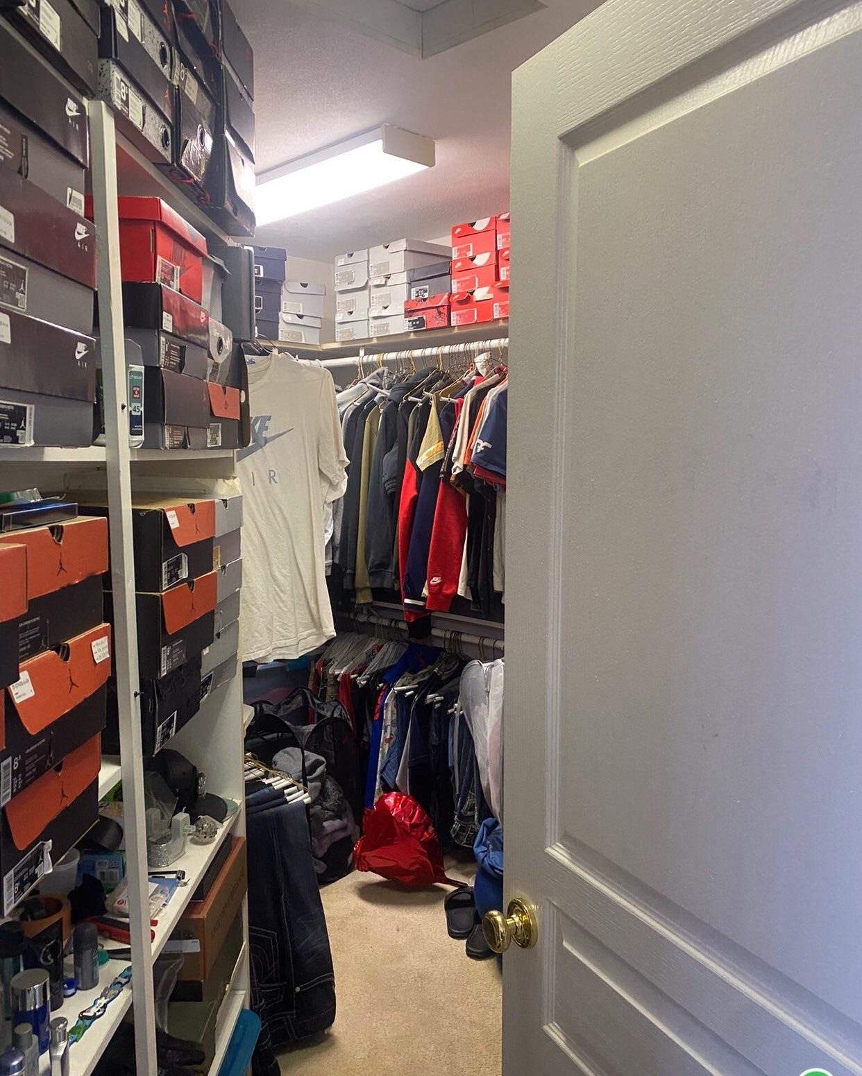 916 Olson Spring Close Belvidere, IL 61008 - Photo 30 of 32 a view of walk in closet with clothes and shoes