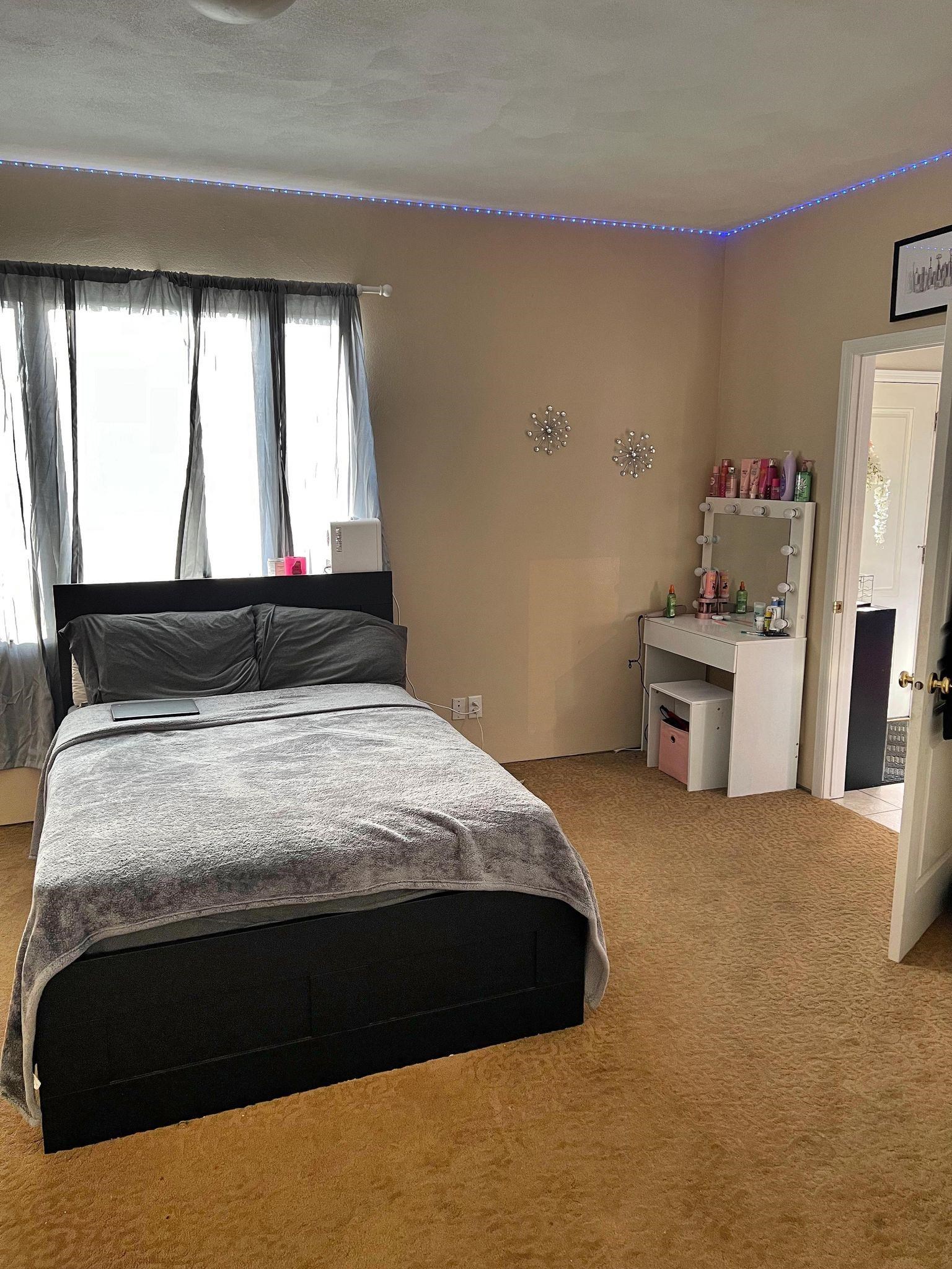 916 Olson Spring Close Belvidere, IL 61008 - Photo 4 of 32 a bed sitting in a bedroom next to a window